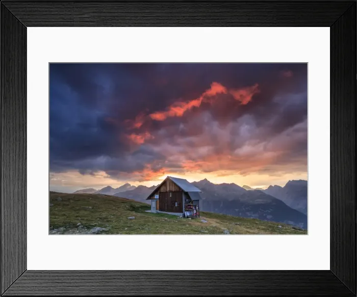 Framed Print : Wooden hut framed by fiery sky and clouds at sunset, Muottas Muragl, St