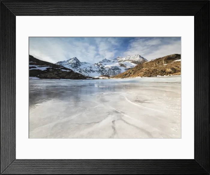 Framed Print : Blue sky and clouds on frozen Lej Nair surrounded by snowy peaks, Bernina Pass, Canton Framed Print : Blue sky and clouds on frozen Lej Nair surrounded by snowy peaks, Bernina Pass, Canton