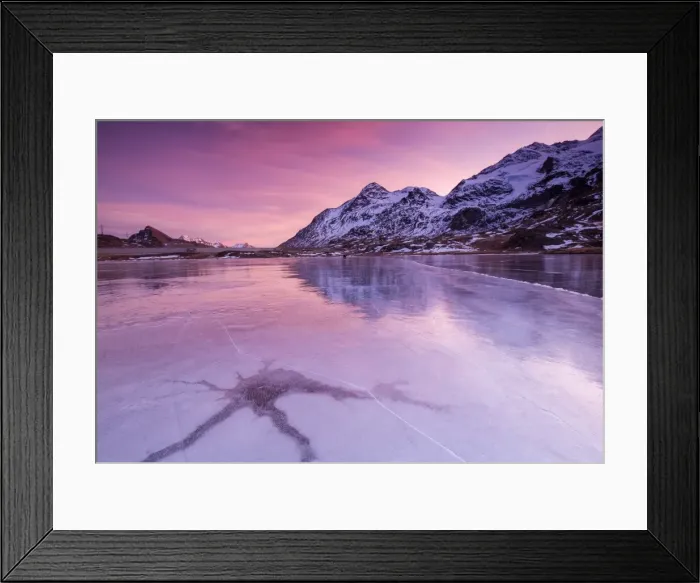 Framed Print : Pink sky at sunset on the frozen Lej Nair framed by snowy peaks, Bernina Pass, Canton of Graubunden Framed Print : Pink sky at sunset on the frozen Lej Nair framed by snowy peaks, Bernina Pass, Canton of Graubunden