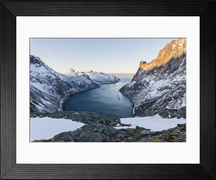 Framed Print : Panorama of peaks of the Ornfjorden framing the village of Fjordgard and Mount Segla in background Framed Print : Panorama of peaks of the Ornfjorden framing the village of Fjordgard and Mount Segla in background