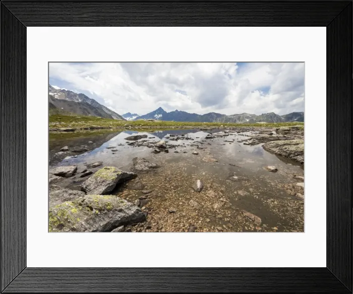 Framed Print : Clouds on rocky peaks reflected in the alpine Lake Schottensee, Fluela Pass, canton of Graubunden Framed Print : Clouds on rocky peaks reflected in the alpine Lake Schottensee, Fluela Pass, canton of Graubunden