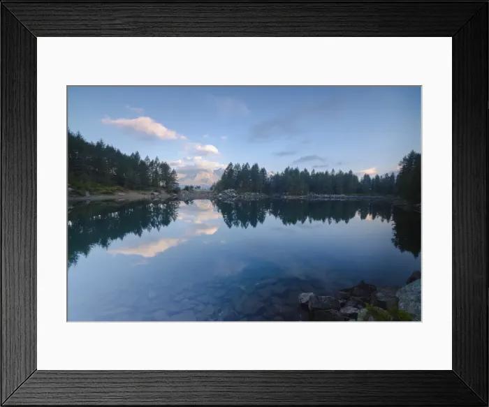 Framed Print : Clouds and woods reflected in Lago Azzurro at dawn, Motta Madesimo, Spluga Valley