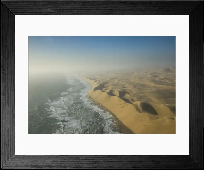 Framed Print : Aerials of sand dunes of the Namib Desert meeting the Atlantic Ocean, Namibia, Africa Framed Print : Aerials of sand dunes of the Namib Desert meeting the Atlantic Ocean, Namibia, Africa