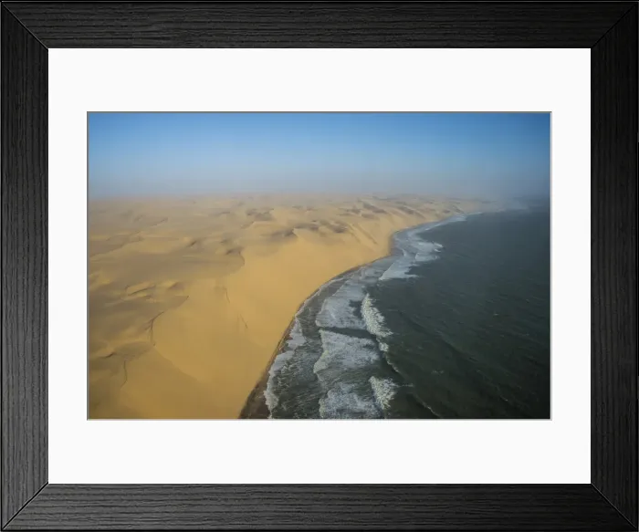 Framed Print : Aerials of sand dunes of the Namib Desert meeting the Atlantic Ocean, Namibia, Africa Framed Print : Aerials of sand dunes of the Namib Desert meeting the Atlantic Ocean, Namibia, Africa