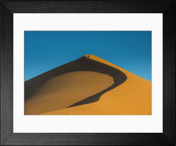 Framed Print : Woman hiking up the giant Sand Dune 45, Sossusvlei, Namib-Naukluft National Park Framed Print : Woman hiking up the giant Sand Dune 45, Sossusvlei, Namib-Naukluft National Park