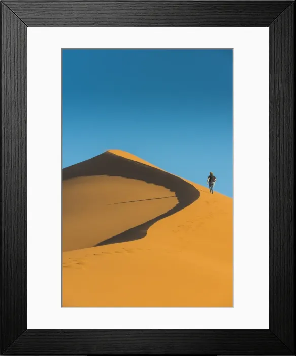 Framed Print : Woman hiking up the giant Sand Dune 45, Sossusvlei, Namib-Naukluft National Park Framed Print : Woman hiking up the giant Sand Dune 45, Sossusvlei, Namib-Naukluft National Park