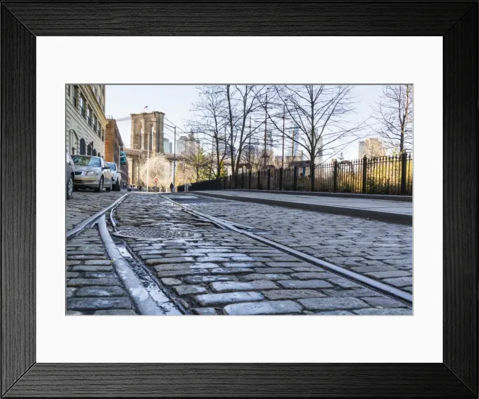 Framed Print : Old rail tracks and cobbled street in Dumbo Historic District, Brooklyn, New York City Framed Print : Old rail tracks and cobbled street in Dumbo Historic District, Brooklyn, New York City