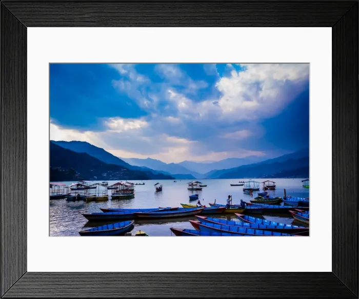 Framed Print : Boats docked on a lake at sunset in Pokhara, Nepal, Asia Framed Print : Boats docked on a lake at sunset in Pokhara, Nepal, Asia