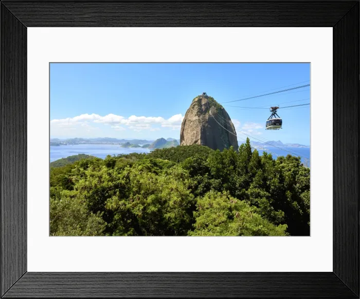 Framed Print : Cable car heading to Sugarloaf mountain seen from Morro da Urca, the first stop of the cable car Framed Print : Cable car heading to Sugarloaf mountain seen from Morro da Urca, the first stop of the cable car
