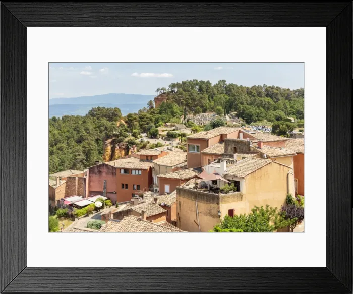 Framed Print : Village houses and the entrance of the Ochre trail in the background, Roussillon Framed Print : Village houses and the entrance of the Ochre trail in the background, Roussillon