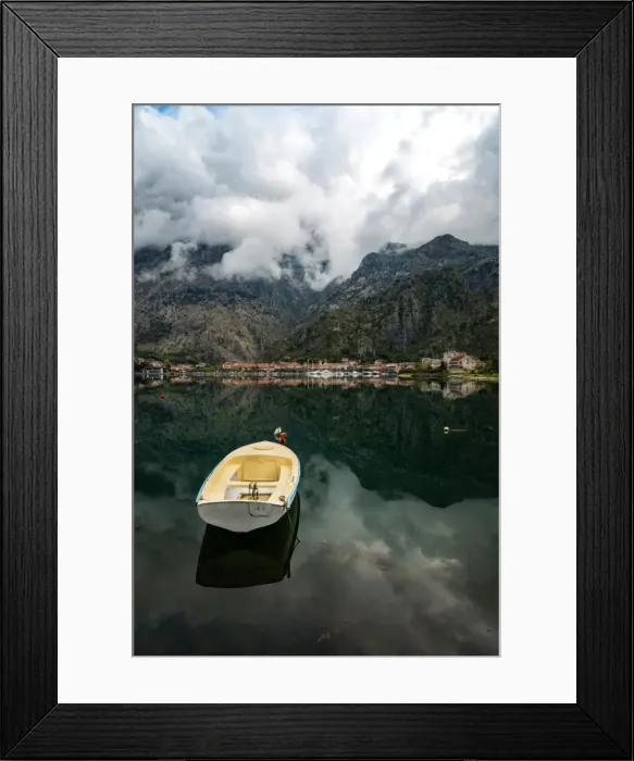 Framed Print : A small fishing boat sits in the reflection of the Old Town (stari grad) of Kotor in Kotor Bay Framed Print : A small fishing boat sits in the reflection of the Old Town (stari grad) of Kotor in Kotor Bay