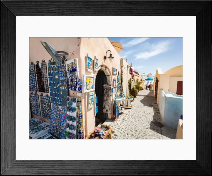 Framed Print : Souvenir shops selling pictures, magnets and jewellery in Oia, Santorini, Cyclades Framed Print : Souvenir shops selling pictures, magnets and jewellery in Oia, Santorini, Cyclades