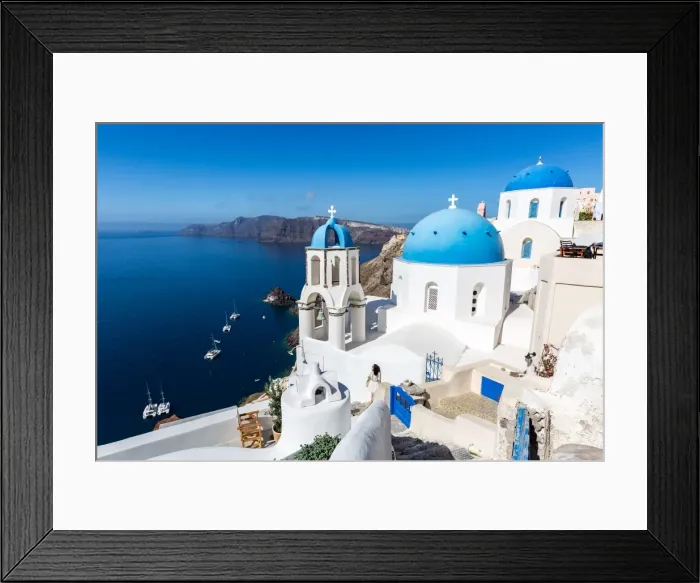 Framed Print : White washed stone buildings and the blue cupolas of a church in Oia, Santorini, Cyclades Framed Print : White washed stone buildings and the blue cupolas of a church in Oia, Santorini, Cyclades