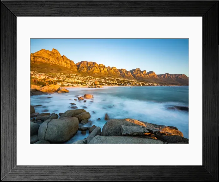 Framed Print : Long exposure at sunset in Camps Bay with Table Mountain and its cable car on the left Framed Print : Long exposure at sunset in Camps Bay with Table Mountain and its cable car on the left