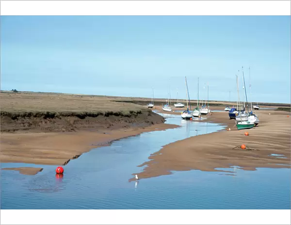 View of the harbour at low tide, morning, Wells-next-the-Sea, North Norfolk, England
