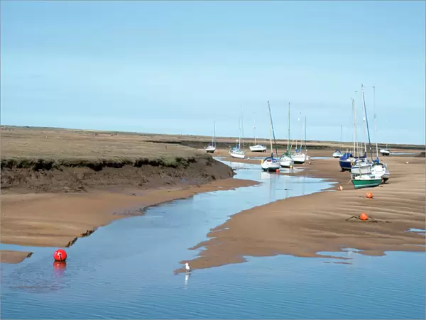 View of the harbour at low tide, morning, Wells-next-the-Sea, North Norfolk, England