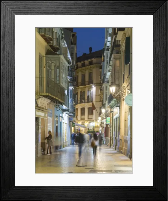Framed Print : Cafes and restaurants on Calle Granada at dusk, Malaga, Costa del Sol, Andalusia Framed Print : Cafes and restaurants on Calle Granada at dusk, Malaga, Costa del Sol, Andalusia