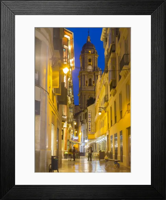 Framed Print : View of Malaga Cathedral from Calle Marques de Larios at dusk, Malaga, Costa del Sol Framed Print : View of Malaga Cathedral from Calle Marques de Larios at dusk, Malaga, Costa del Sol