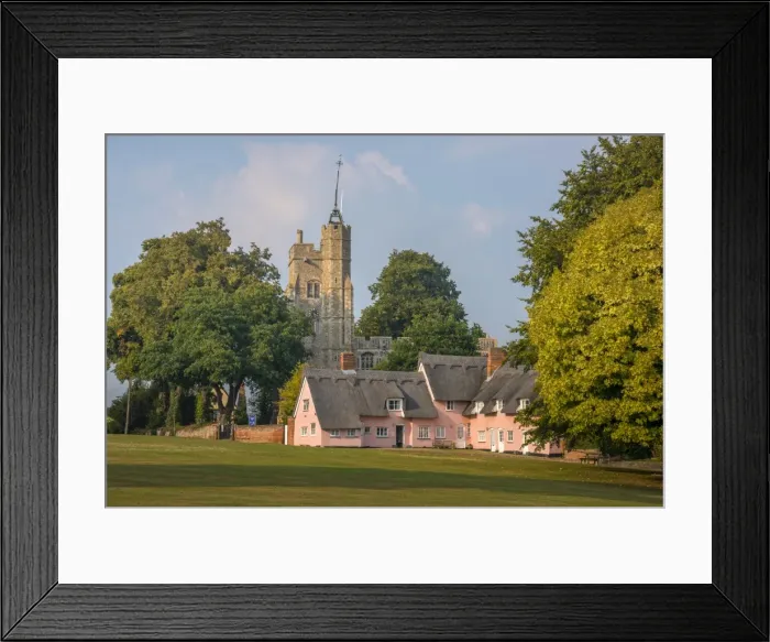 Framed Print : St. Mary the Virgins Church and the Pink Cottages, Cavendish, Suffolk, England, United Kingdom Framed Print : St. Mary the Virgins Church and the Pink Cottages, Cavendish, Suffolk, England, United Kingdom