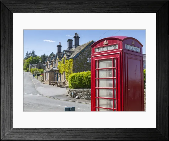 Framed Print : Red telephone box in Beeley Village in springtime, Derbyshire Dales, Derbyshire, England