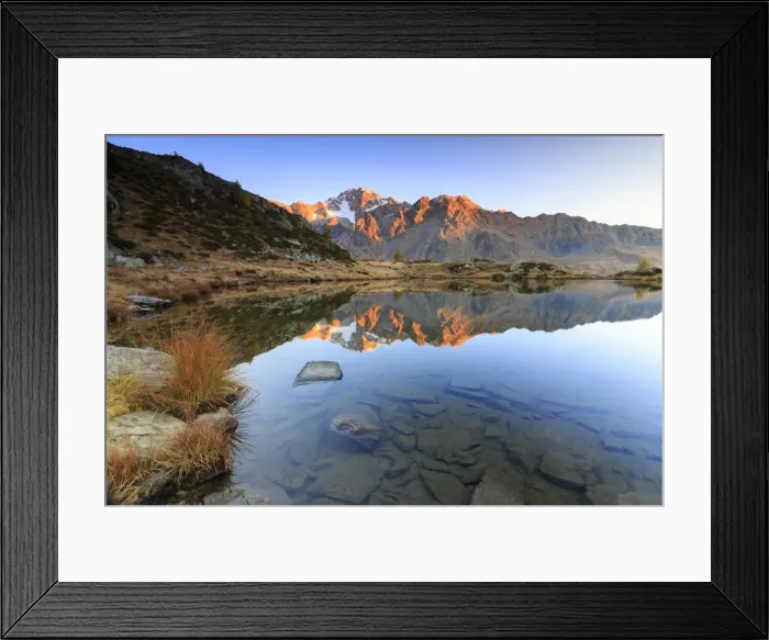 Framed Print : Rocky peaks of Mount Disgrazia reflected in Lake Zana at sunrise, Malenco Valley Framed Print : Rocky peaks of Mount Disgrazia reflected in Lake Zana at sunrise, Malenco Valley
