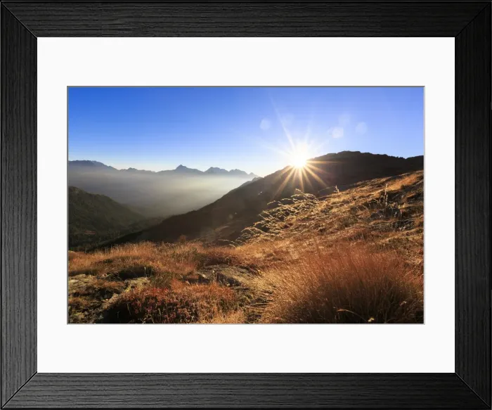 Framed Print : Sunbeams on alpine pastures with peak Scalino in the background, Val Torreggio, Malenco Valley Framed Print : Sunbeams on alpine pastures with peak Scalino in the background, Val Torreggio, Malenco Valley