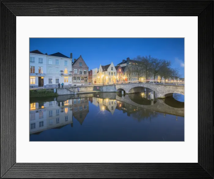 Framed Print : Dusk lights on the historic buildings of the city centre reflected in typical canals