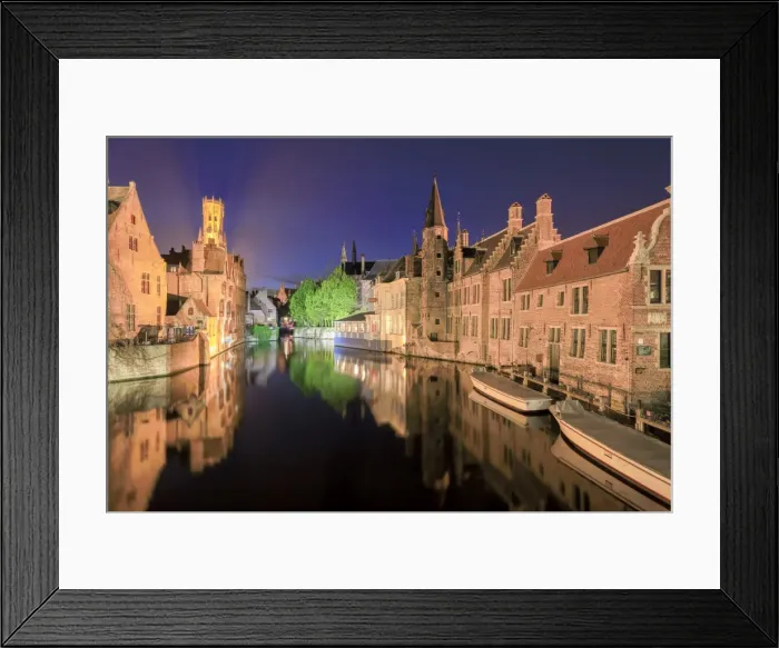 Framed Print : The medieval Belfry and historic buildings are reflected in Rozenhoedkaai canal at night