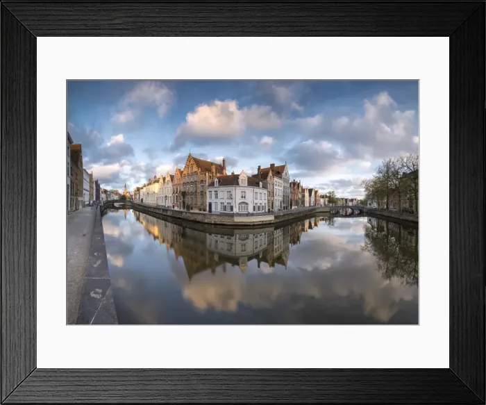 Framed Print : Pink clouds at dawn on the Belfry and historic buildings reflected in the typical canal