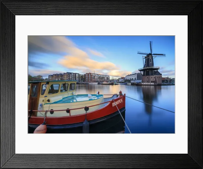 Framed Print : The fishing boat frames the Windmill De Adriaan reflected in the River Spaarne at dusk Framed Print : The fishing boat frames the Windmill De Adriaan reflected in the River Spaarne at dusk