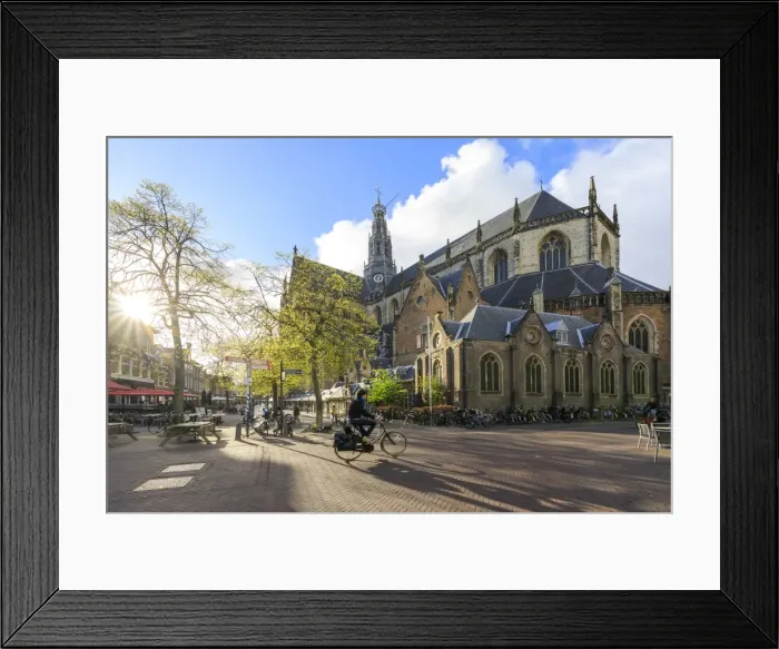 Framed Print : Bicycles in the pedestrian square next to the ancient church Grote Kerk, Haarlem Framed Print : Bicycles in the pedestrian square next to the ancient church Grote Kerk, Haarlem
