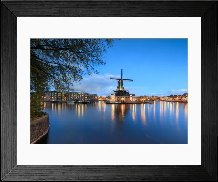 Framed Print : Dusk lights on the Windmill De Adriaan reflected in the River Spaarne, Haarlem, North Holland Framed Print : Dusk lights on the Windmill De Adriaan reflected in the River Spaarne, Haarlem, North Holland