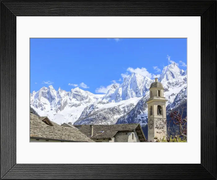 Framed Print : Blue sky in spring on bell tower and stone roofs, Soglio, Maloja, Bregaglia Valley Framed Print : Blue sky in spring on bell tower and stone roofs, Soglio, Maloja, Bregaglia Valley