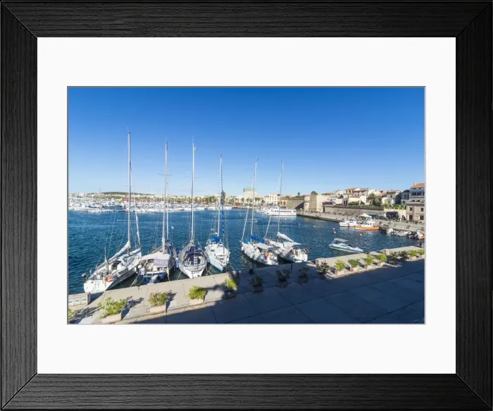 Framed Print : View over the boat harbour of the coastal town of Alghero, Sardinia, Italy, Mediterranean Framed Print : View over the boat harbour of the coastal town of Alghero, Sardinia, Italy, Mediterranean