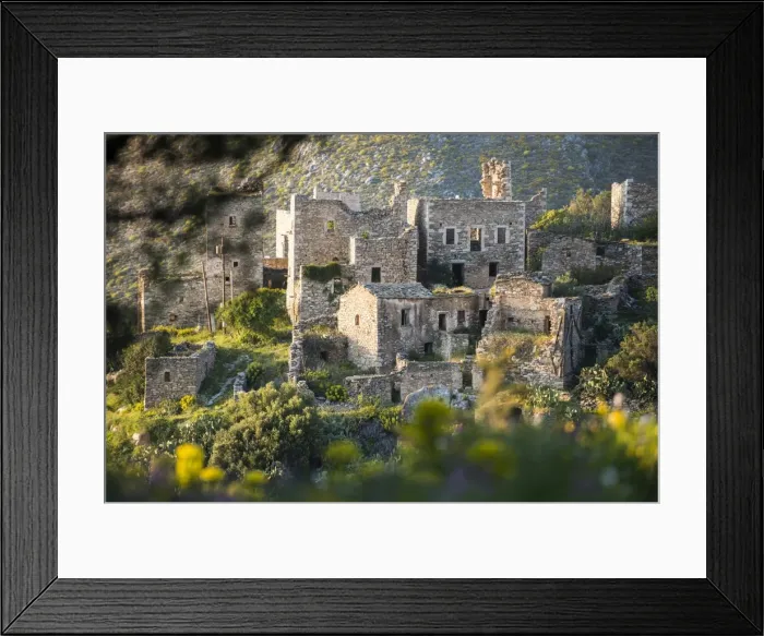 Framed Print : The ancient towers of Vathia among wild spring flowers on the Mani Peninsula in the Peloponnese Framed Print : The ancient towers of Vathia among wild spring flowers on the Mani Peninsula in the Peloponnese
