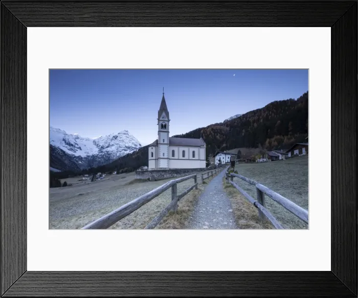 Framed Print : Church of Trafoi during frozen twilight with moon in the sky, Trafoi, Stelvio National Park Framed Print : Church of Trafoi during frozen twilight with moon in the sky, Trafoi, Stelvio National Park