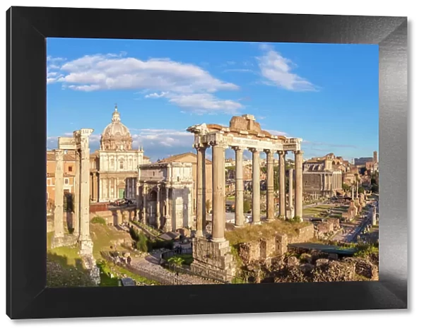 The columns of the Temple of Saturn and overview of the ruined Roman Forum, UNESCO