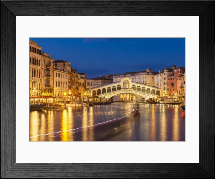 Framed Print : Rialto Bridge (Ponte di Rialto) at night with boat light trails on the Grand Canal Framed Print : Rialto Bridge (Ponte di Rialto) at night with boat light trails on the Grand Canal