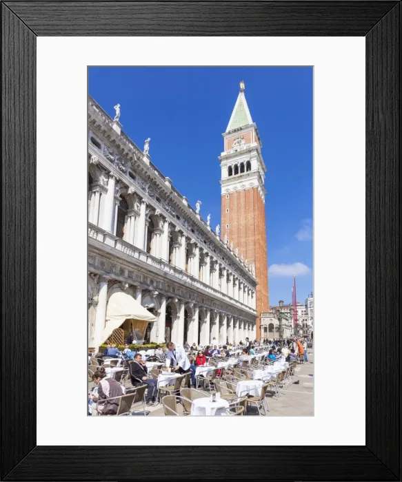 Framed Print : Campanile tower, Piazzetta, and tourists enjoying the cafes of St. Marks Square, Venice Framed Print : Campanile tower, Piazzetta, and tourists enjoying the cafes of St. Marks Square, Venice
