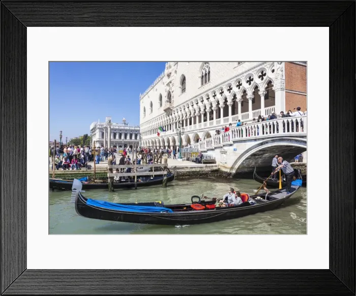 Framed Print : Gondola, with tourists, under the Ponte de Paglia, next to the Doges Palace (Palazzo Ducale) Framed Print : Gondola, with tourists, under the Ponte de Paglia, next to the Doges Palace (Palazzo Ducale)