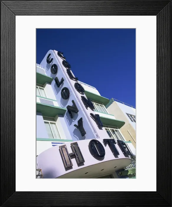 Framed Print : Low angle view of the neon sign of the Colony Hotel Framed Print : Low angle view of the neon sign of the Colony Hotel