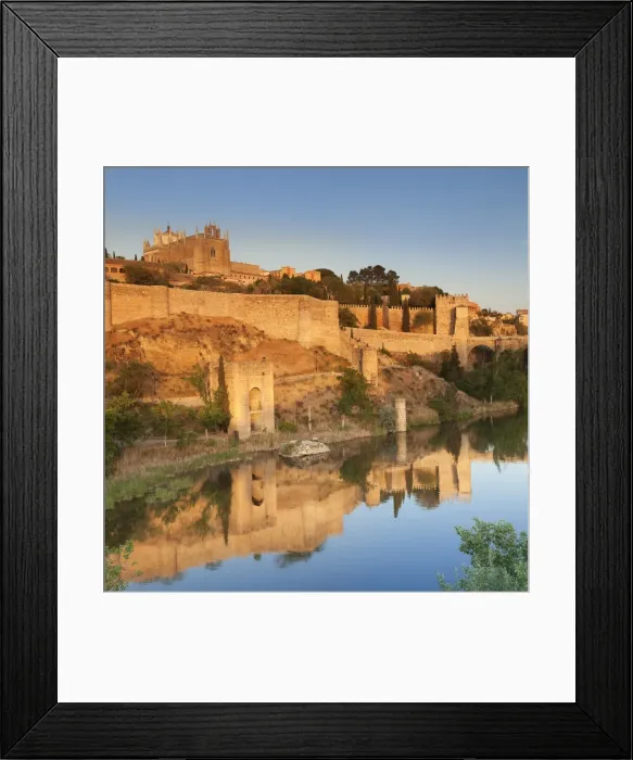 Framed Print : San Juan des los Reyes Monastery and town wall reflected in the Tajo River, Toledo Framed Print : San Juan des los Reyes Monastery and town wall reflected in the Tajo River, Toledo