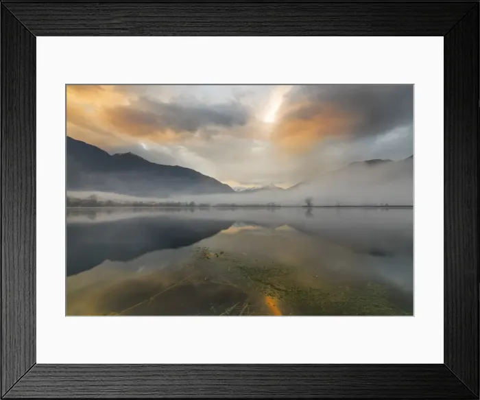 Framed Print : Mountains reflected in water at dawn shrouded by mist, Pozzo di Riva Novate, Mezzola Framed Print : Mountains reflected in water at dawn shrouded by mist, Pozzo di Riva Novate, Mezzola