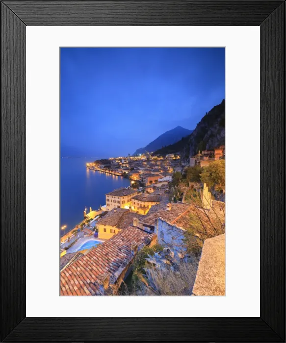 Framed Print : Dusk lights up Lake Garda and the typical town of Limone Sul Garda, province of Brescia Framed Print : Dusk lights up Lake Garda and the typical town of Limone Sul Garda, province of Brescia