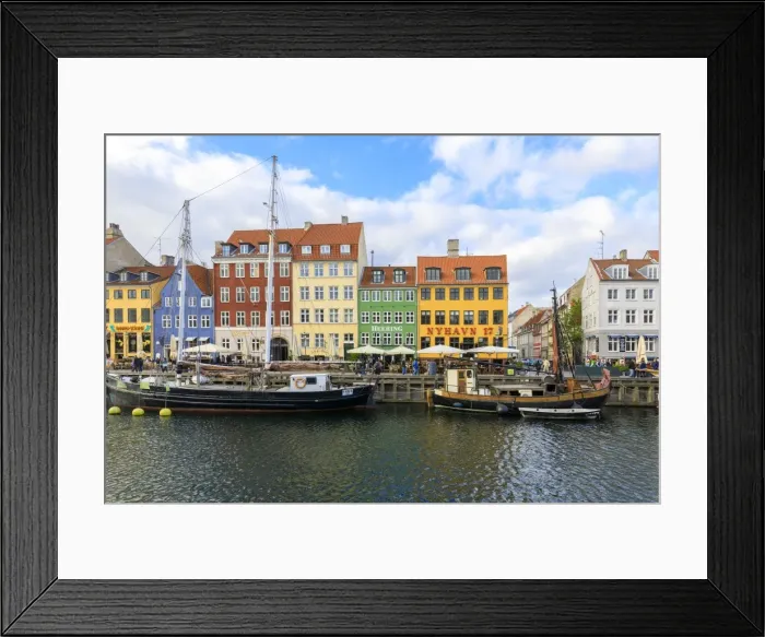 Framed Print : Colourful facades along canal and entertainment district of Nyhavn, Copenhagen, Denmark Framed Print : Colourful facades along canal and entertainment district of Nyhavn, Copenhagen, Denmark