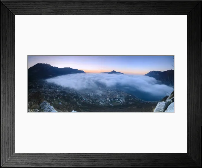 Framed Print : Panoramic of fog at sunrise above the city of Lecco seen from Monte San Martino, Province of Lecco Framed Print : Panoramic of fog at sunrise above the city of Lecco seen from Monte San Martino, Province of Lecco