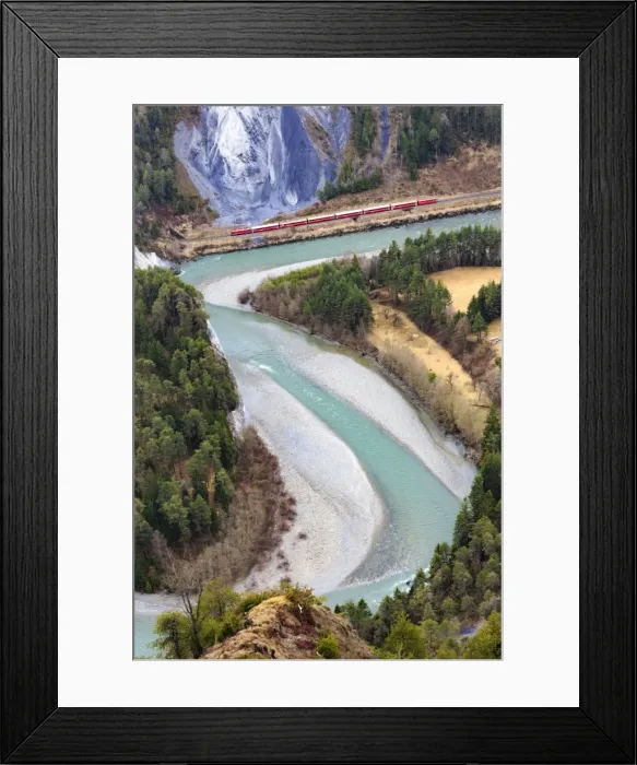 Framed Print : The Red Train travels along the Rhine River, Rhein Gorge (Ruinaulta), Flims, Imboden Framed Print : The Red Train travels along the Rhine River, Rhein Gorge (Ruinaulta), Flims, Imboden