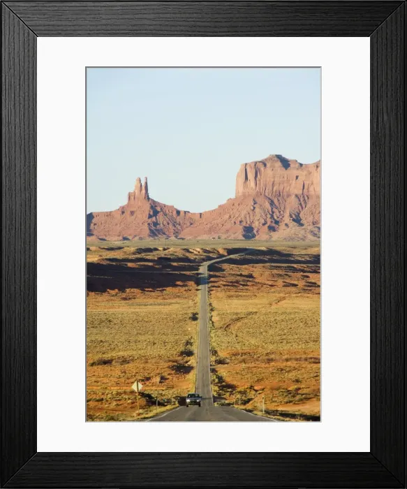 Framed Print : A long straight road leads into Monument Valley Navajo Tribal Park Framed Print : A long straight road leads into Monument Valley Navajo Tribal Park