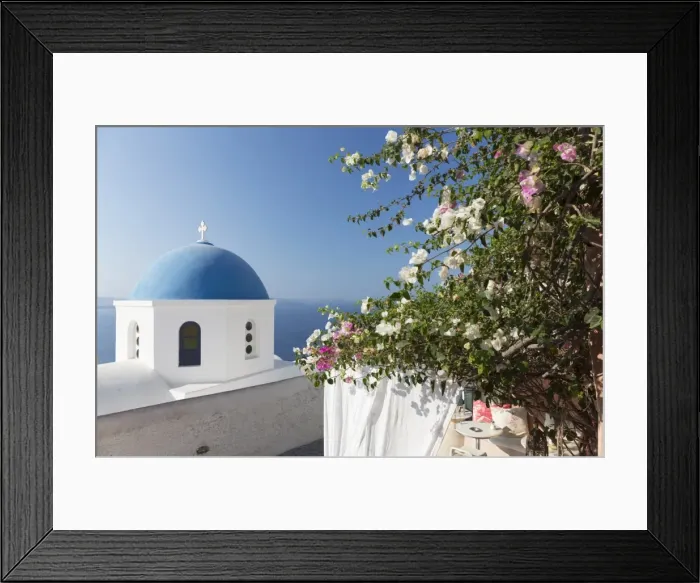 Framed Print : White church with blue dome and flowers, Oia, Santorini, Cyclades, Greek Islands Framed Print : White church with blue dome and flowers, Oia, Santorini, Cyclades, Greek Islands