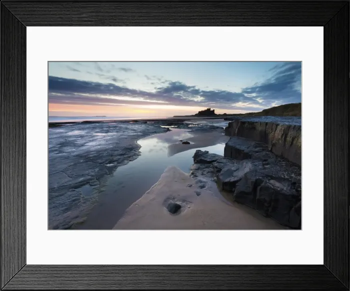 Framed Print : View towards Bamburgh Castle at sunrise from Bamburgh Beach, Bamburgh, Northumberland Framed Print : View towards Bamburgh Castle at sunrise from Bamburgh Beach, Bamburgh, Northumberland